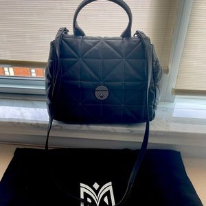 Milly black leather cross body handbag with white stitching, practically new.